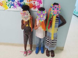 Child care curriculum at West Oaks Private Day School making masks